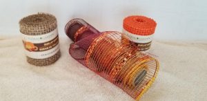 Rolls of Burlap Ribbon from Dollar Tree to use on Fall Decor.