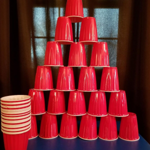 Easy plastic cups stacking game. A fun Mintue to Win It game to use at Christmas parties.
