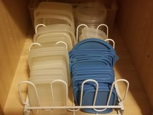 Declutter your Kitchen by Organizing your Tuperware. Stop losing tops and bottoms with a simple some simple Tupperware organization.