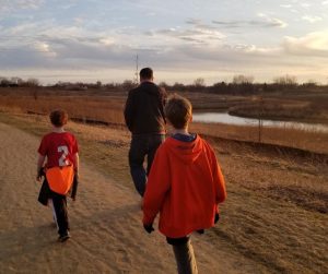 Family Bonding time on a nature walk or hike with your kids.